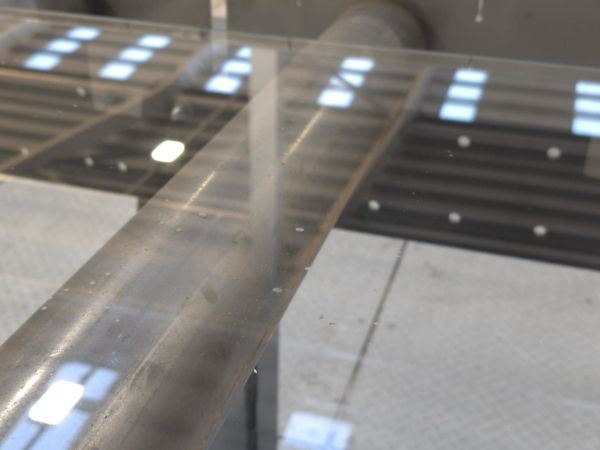 Transforming Glass Manufacturing: Intelligent Robotic Inspection for Tiny Inclusions in Glass